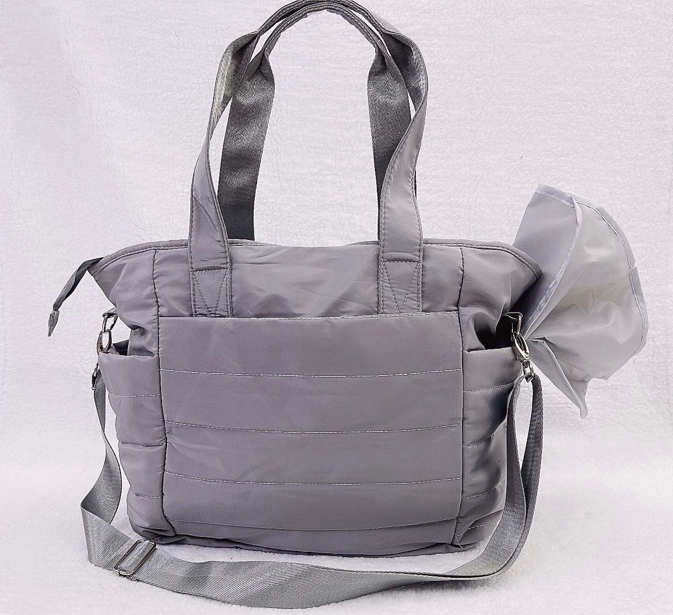 Bolso maternal impermeable mas mudador color gris