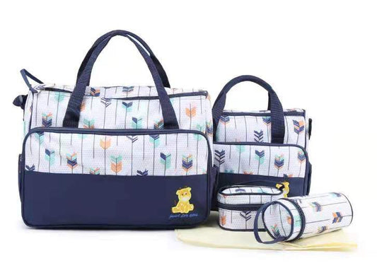 Bolso maternal 5 piezas con diseño de plumas color azul oscuro.